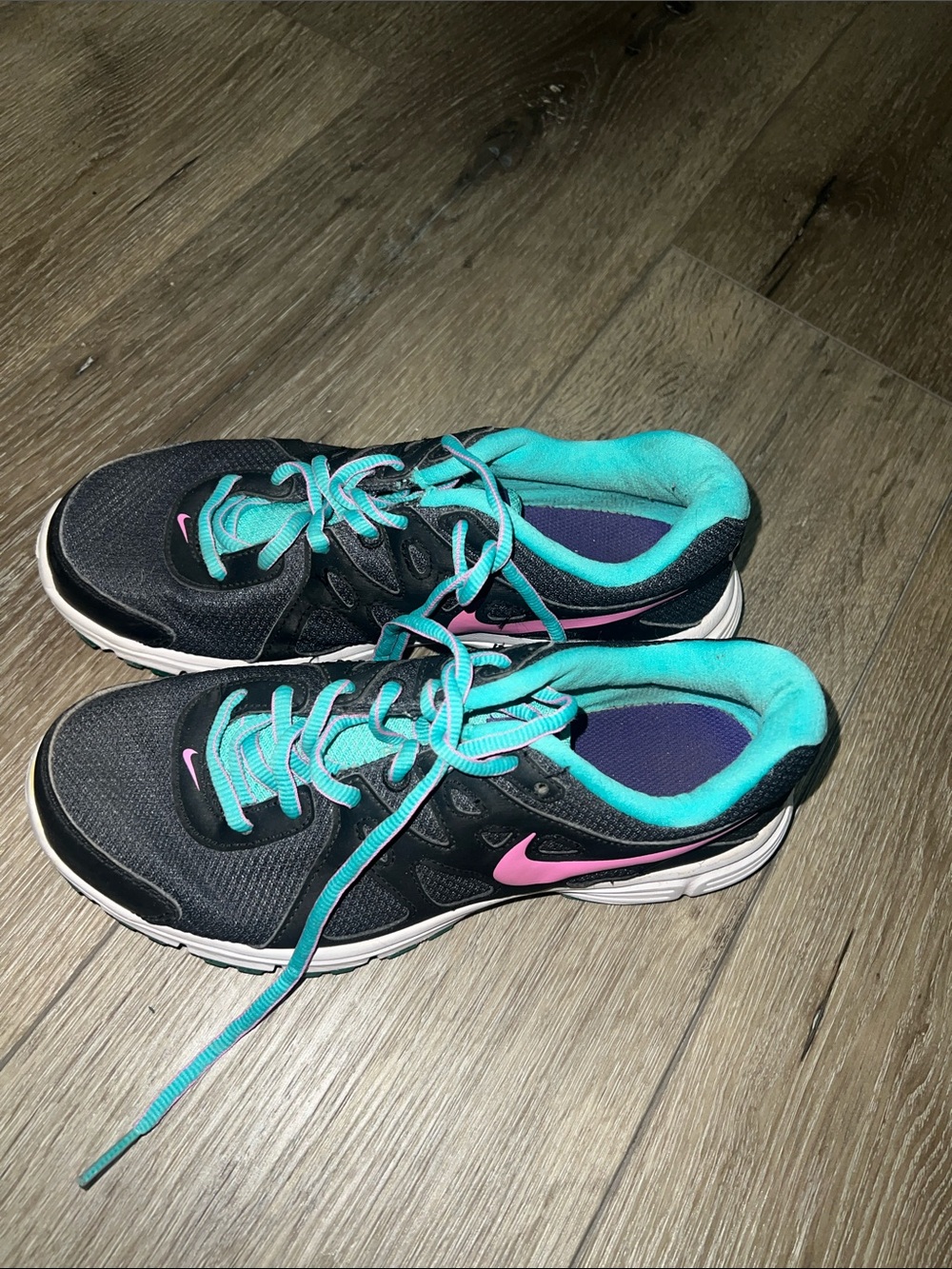 Nike Women's Black Running Shoes with Teal Lining and Pink Swoosh